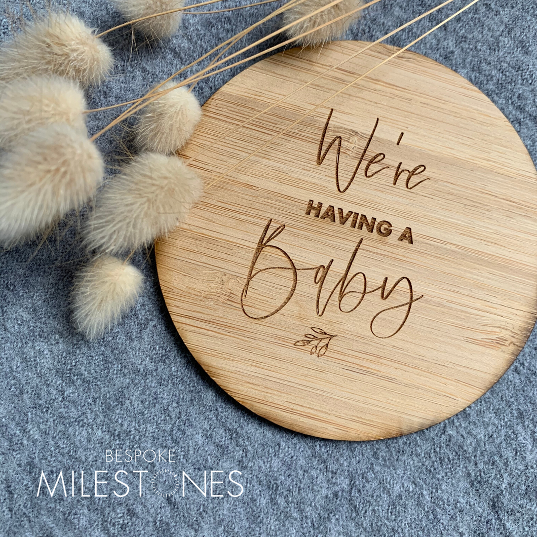We're having a baby bamboo announcement plaque
